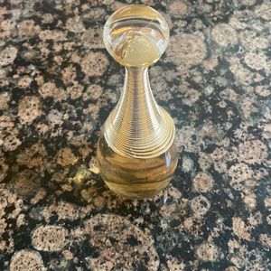 Jadore 3.4oz.   Used a handful of times. I have too many fragrances.